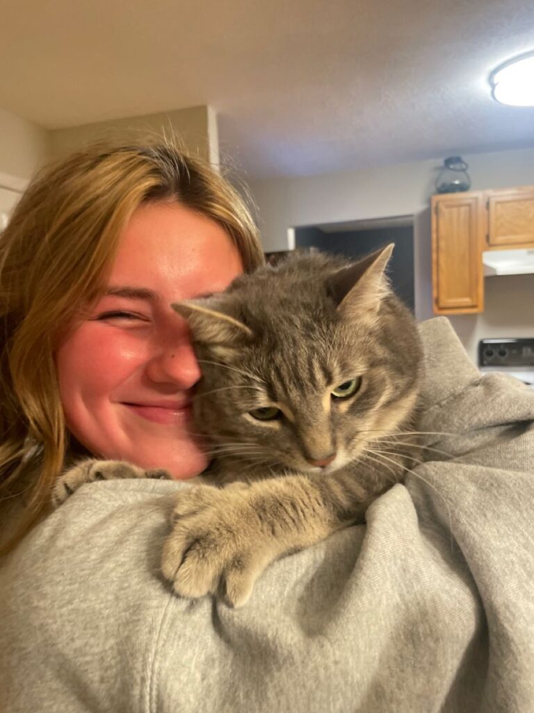Keeping a cat’s routine consistent before welcoming a baby.